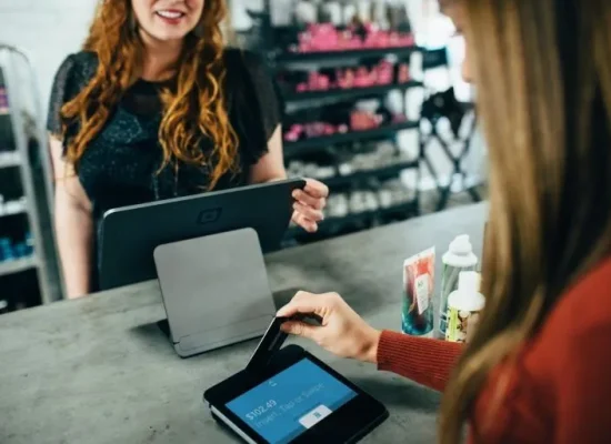 woman-serving-customer-min-768x513